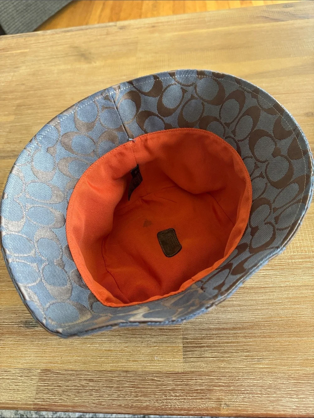 Coach Signature Jacquard Bucket Hat in a blue and brown monogram print